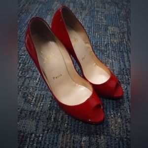 Gorgeous red patent leather peep toe louboutin heels